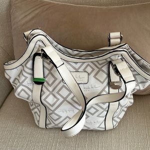 Nicole Miller short shoulder bag with two inside zipper pockets .